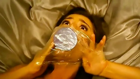 Gagged With A Dildo