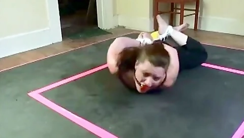 Wrestler Hogtied And Ballgagged